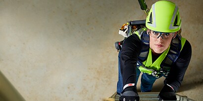 Woman wearing personal protection equipment
