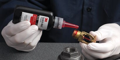 3M™ Scotch-Weld™ Threadlocker TL72 being applied to ceiling fire sprinkler.

