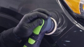 Sander being used on small area of a car