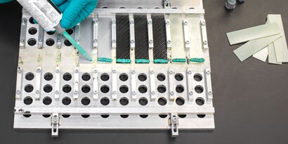 Urethane Adhesive being applied to object
