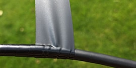 Scotch® Vinyl Electrical Tape Super 33+™ being wrapped around a cable outside