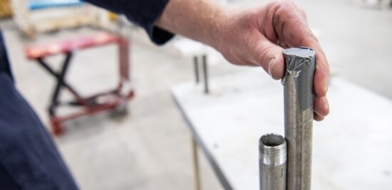 A metal rod with duct tape over the end.

